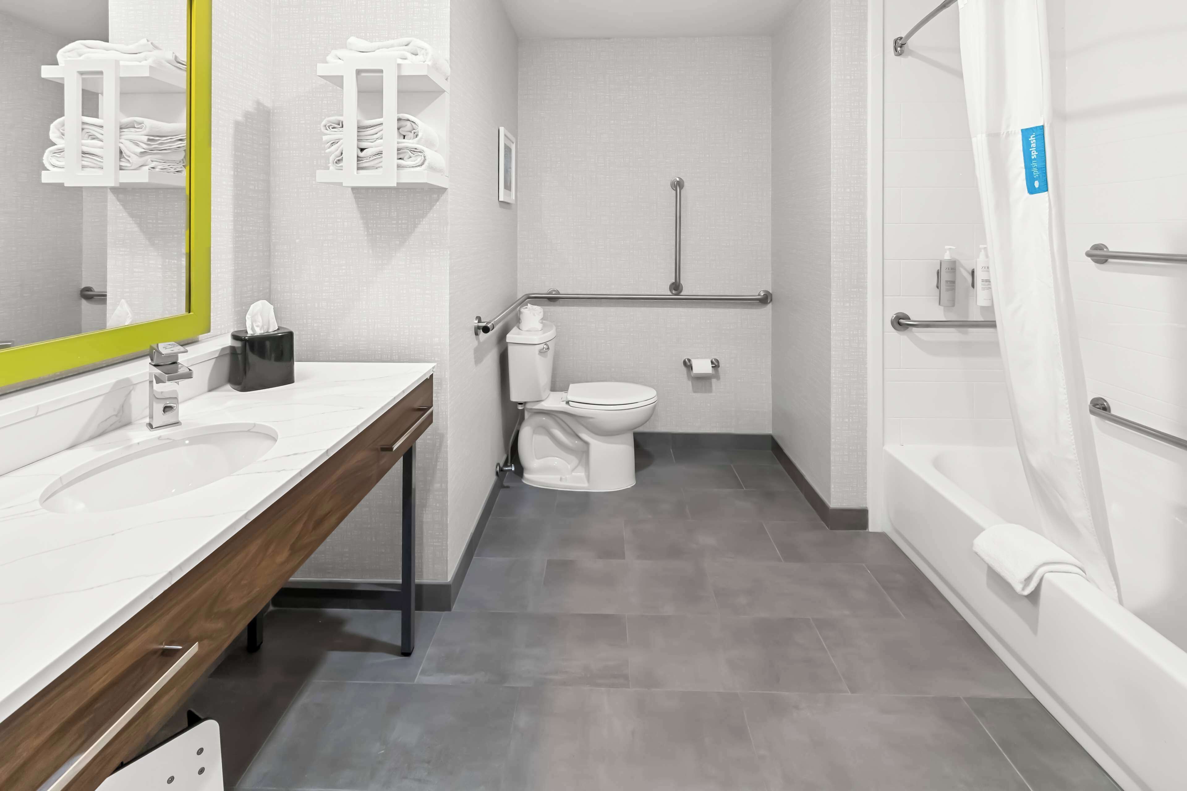 handicap accessible, non-smoking, double queen room | bathroom | combined shower/bathtub, free toiletries, hair dryer, towels