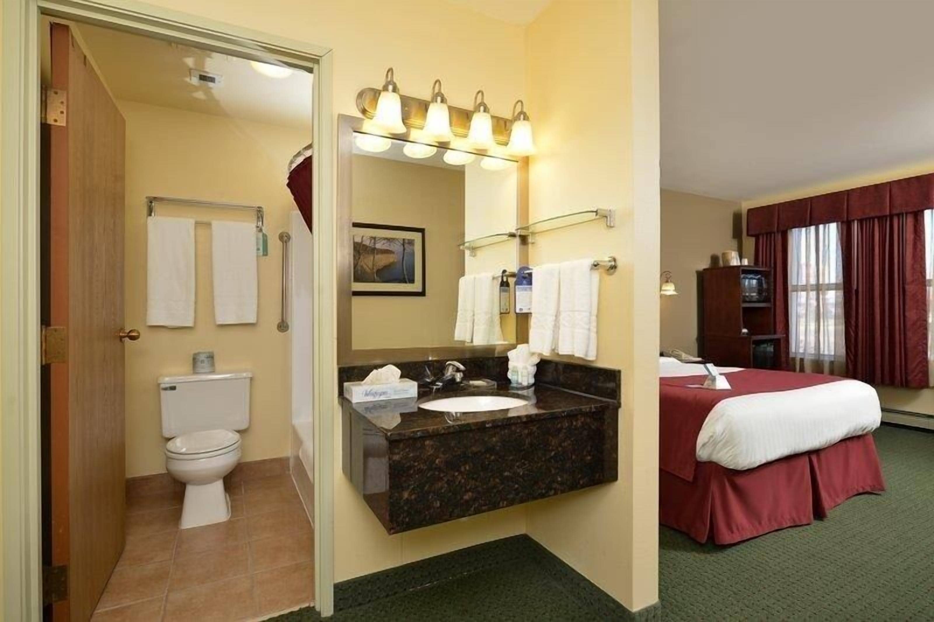 combined shower/bathtub, free toiletries, hair dryer, towels