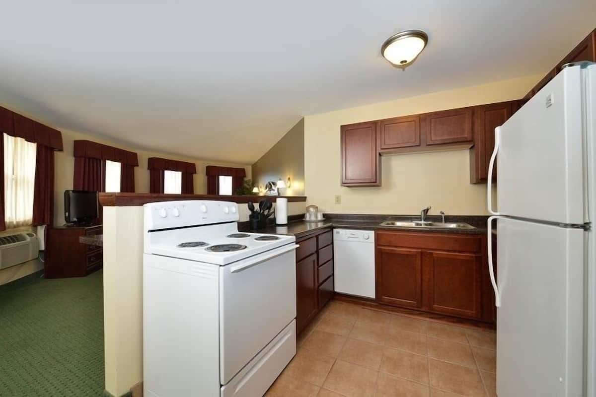 desk, laptop workspace, blackout curtains, iron/ironing board