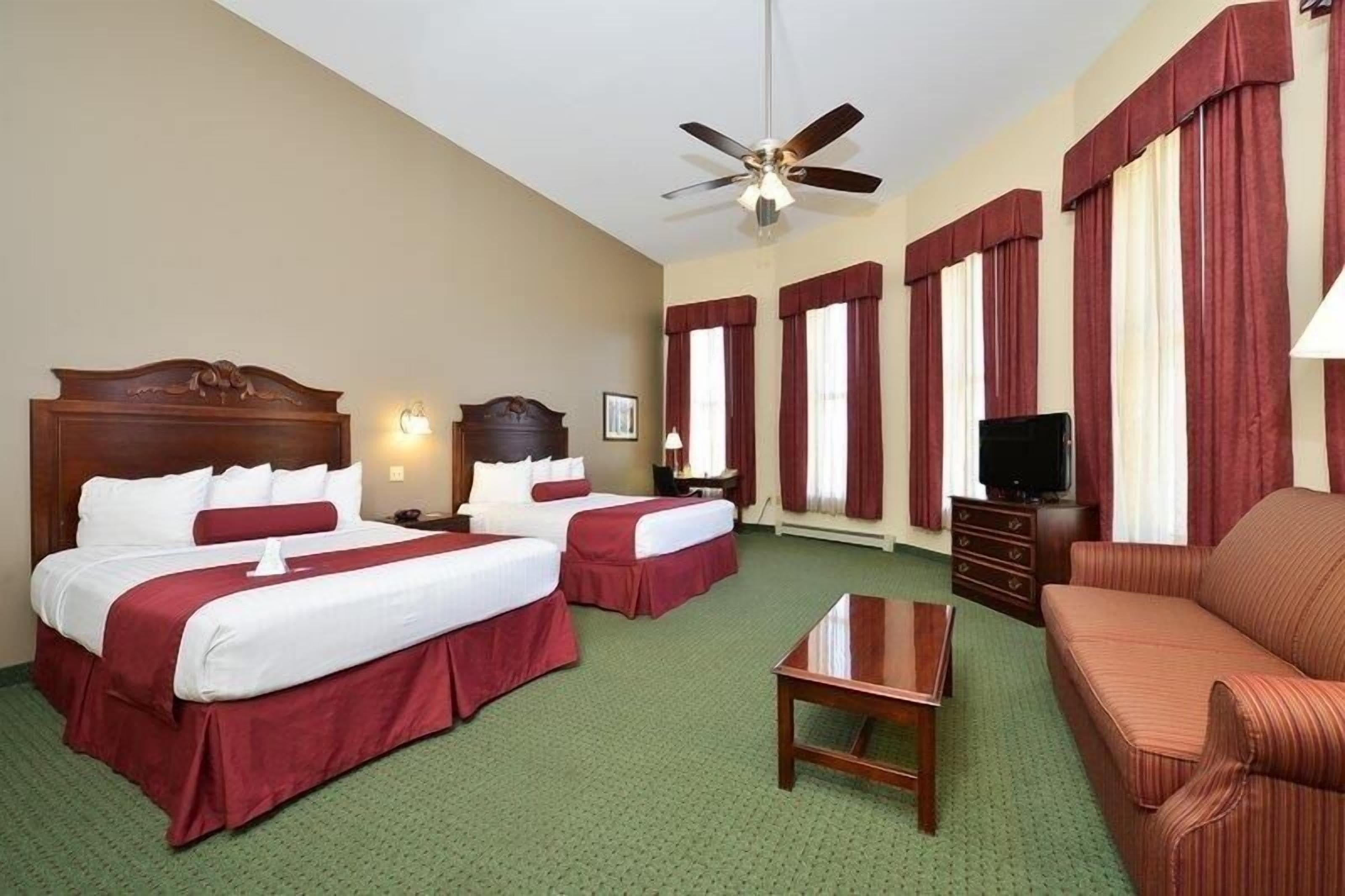 standard room, 2 queen beds, non smoking, lake view | desk, laptop workspace, blackout curtains, iron/ironing board