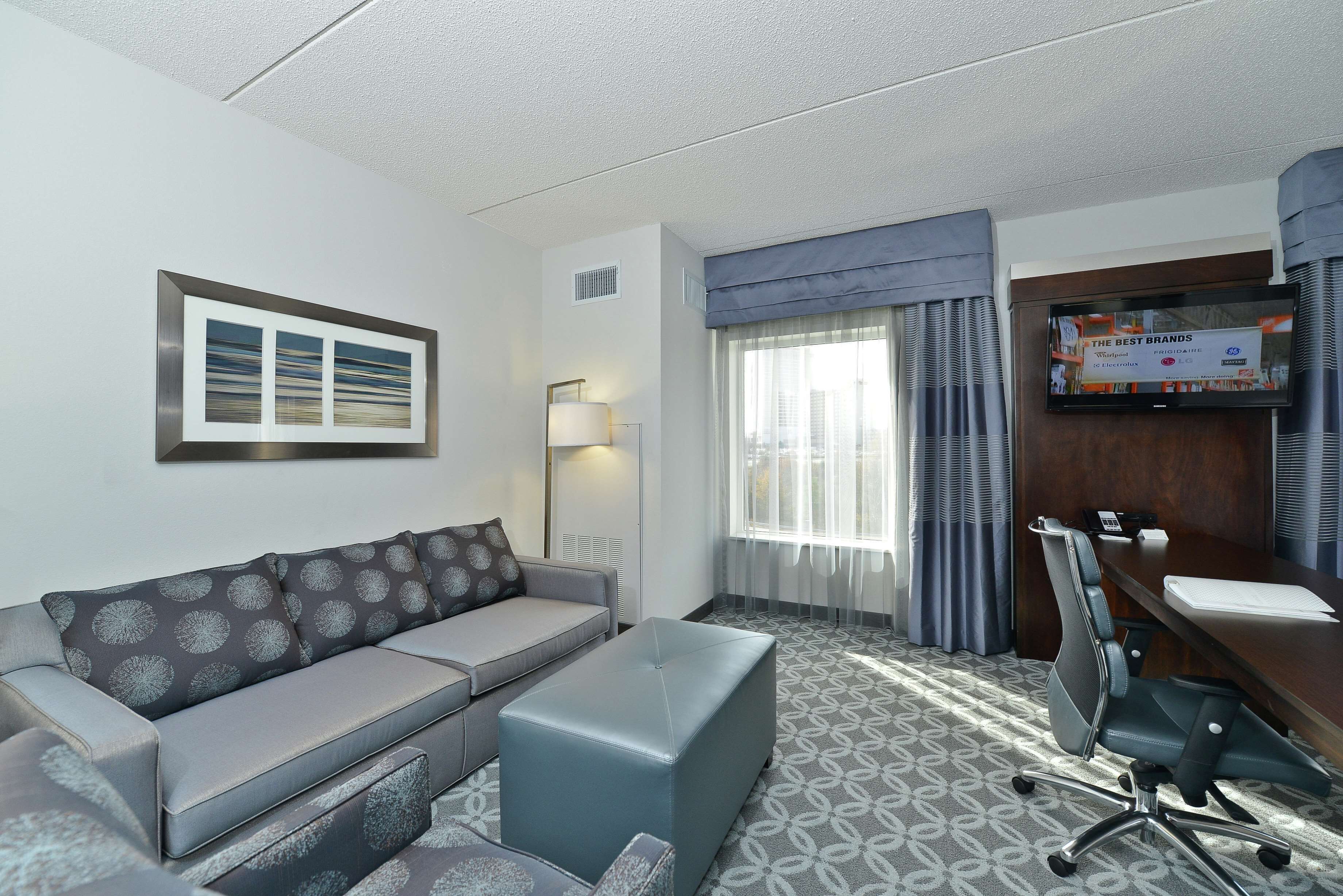 down duvets, pillow-top beds, in-room safe, laptop workspace