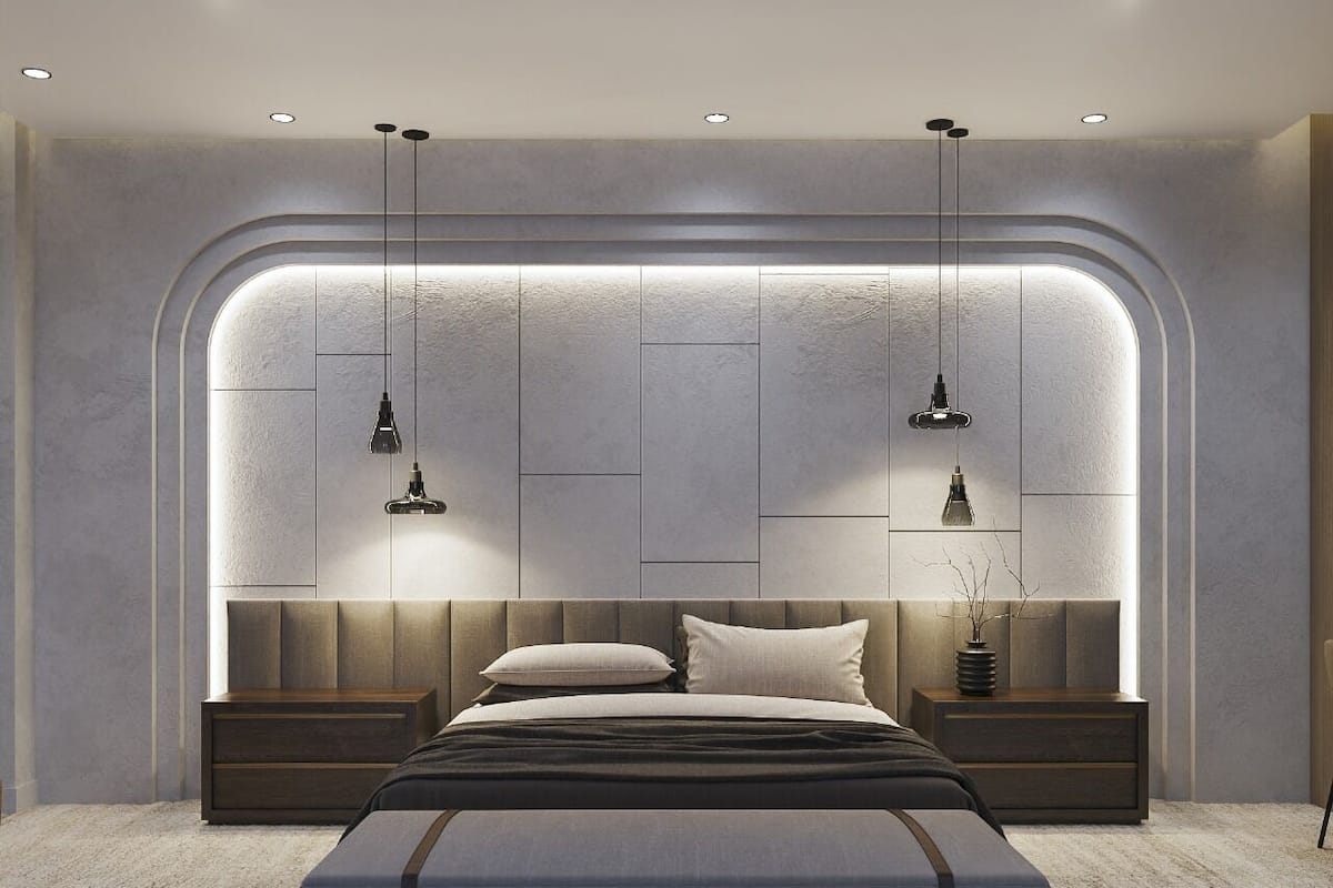 A modern bedroom with a large bed, two bedside tables, and a unique wall design.