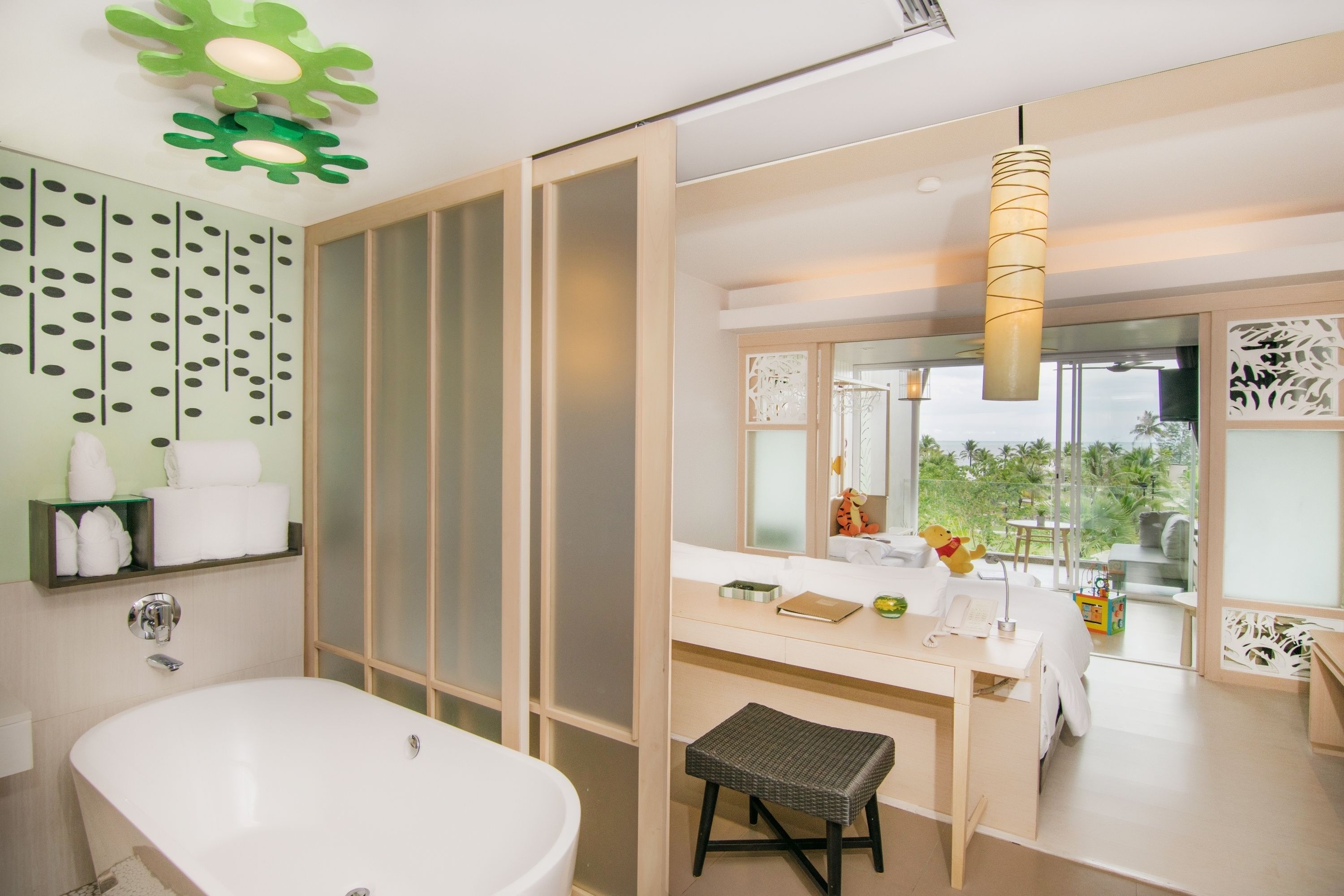 family room | bathroom | shower, rainfall showerhead, designer toiletries, hair dryer