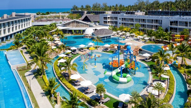 A resort with multiple swimming pools, water slides, and palm trees. - The Sands Khao Lak by Katathani (Takua Pa)