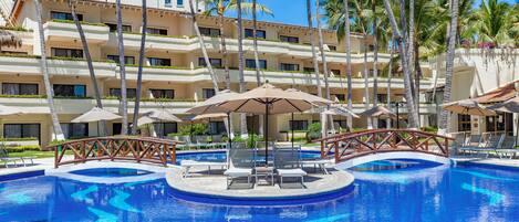 Outdoor pool, open 9 AM to 9 PM, pool umbrellas, pool loungers