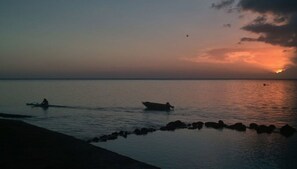 On the beach, white sand, beach towels, snorkelling