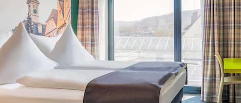 Desk, blackout drapes, soundproofing, free WiFi