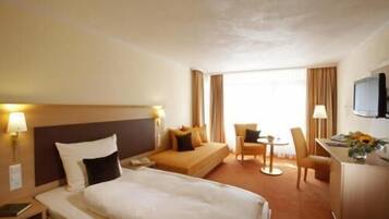 Roba de llit d'alta qualitat, minibar i caixa forta a l'habitació