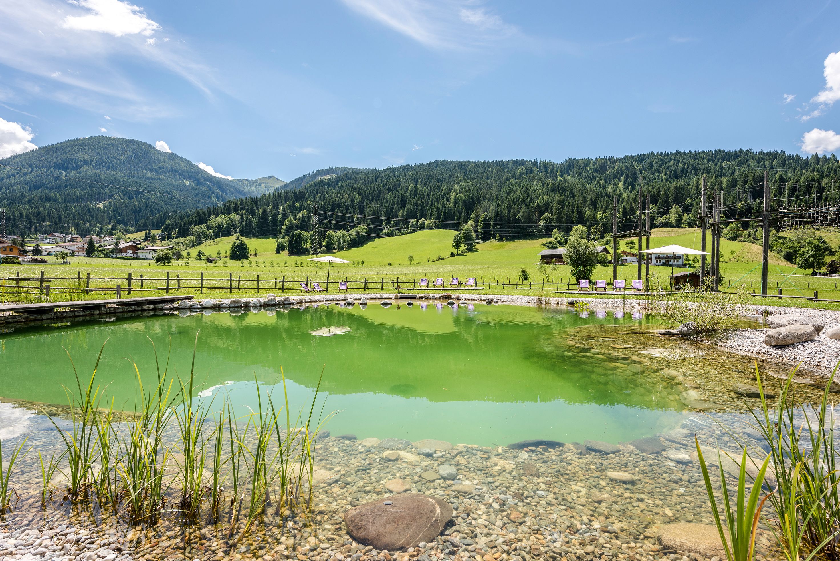indoor pool, seasonal outdoor pool, pool umbrellas, pool loungers