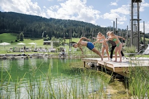 Indoor pool, seasonal outdoor pool, pool umbrellas, pool loungers