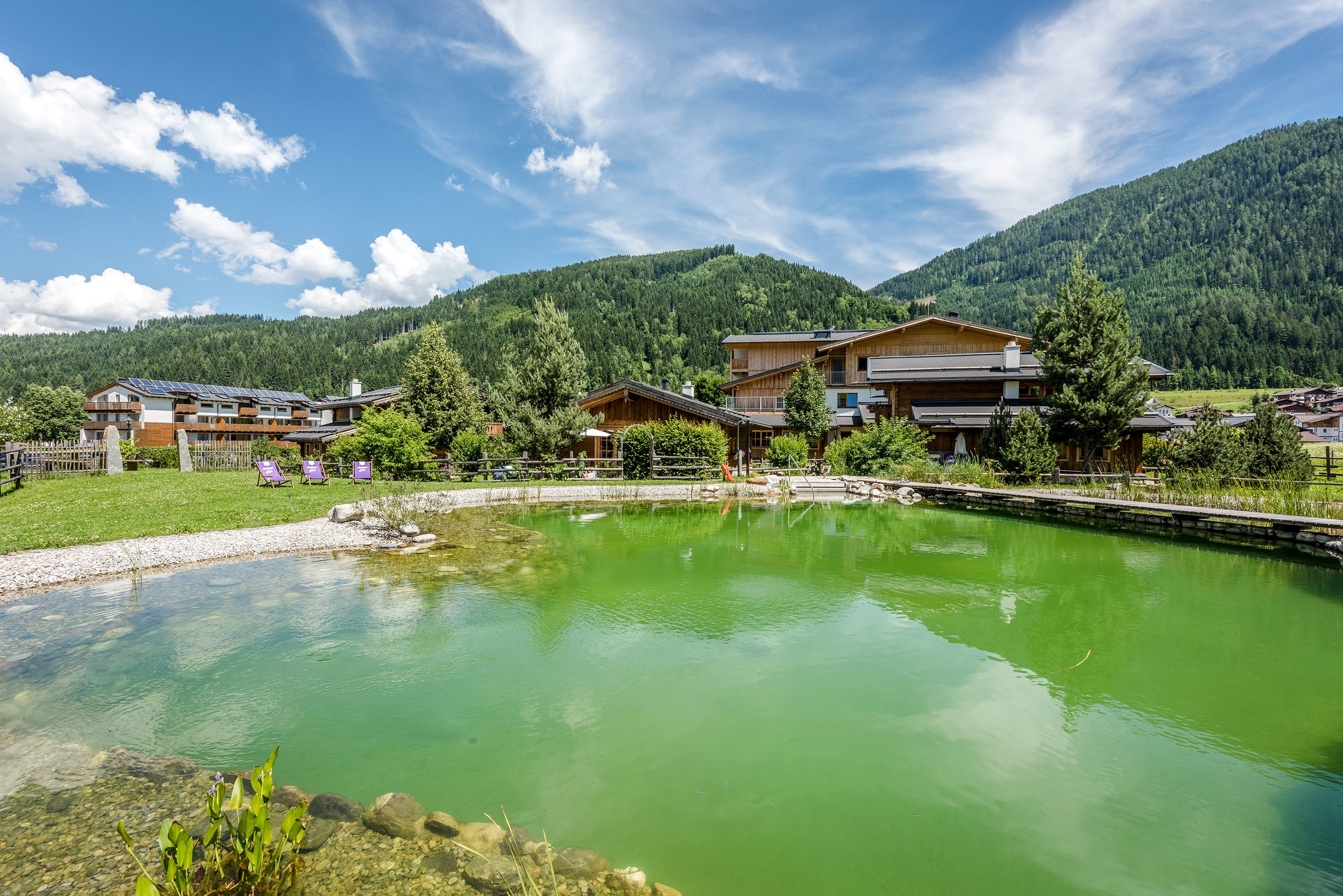indoor pool, seasonal outdoor pool, pool umbrellas, pool loungers