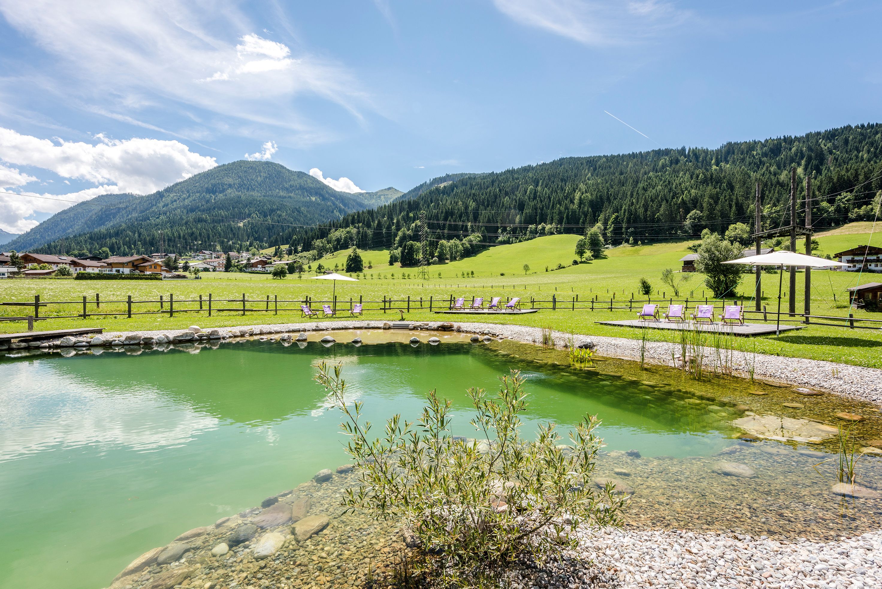 indoor pool, seasonal outdoor pool, pool umbrellas, pool loungers