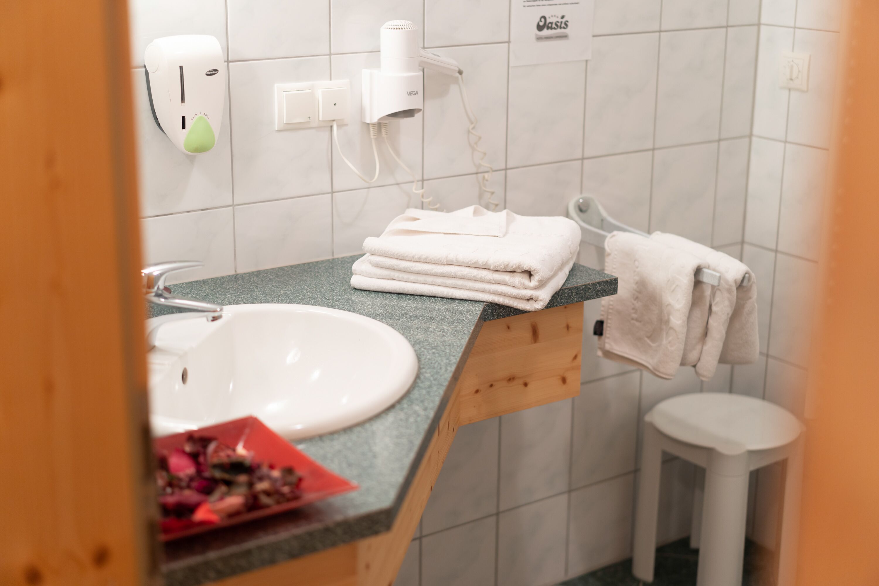 shower, hair dryer, bathrobes, towels