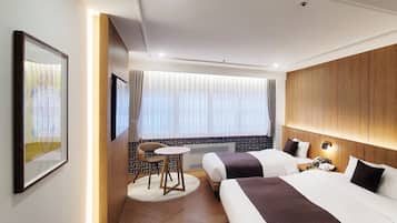 Kamar Twin Premier, pemandangan pelabuhan | 1 kamar tidur, minibar, brankas, dan tirai kedap cahaya