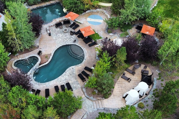 Seasonal outdoor pool, pool umbrellas, pool loungers