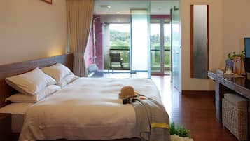 Premium bedding, down comforters, pillowtop beds, in-room safe