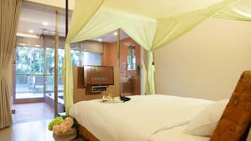 Premium bedding, down comforters, pillowtop beds, in-room safe