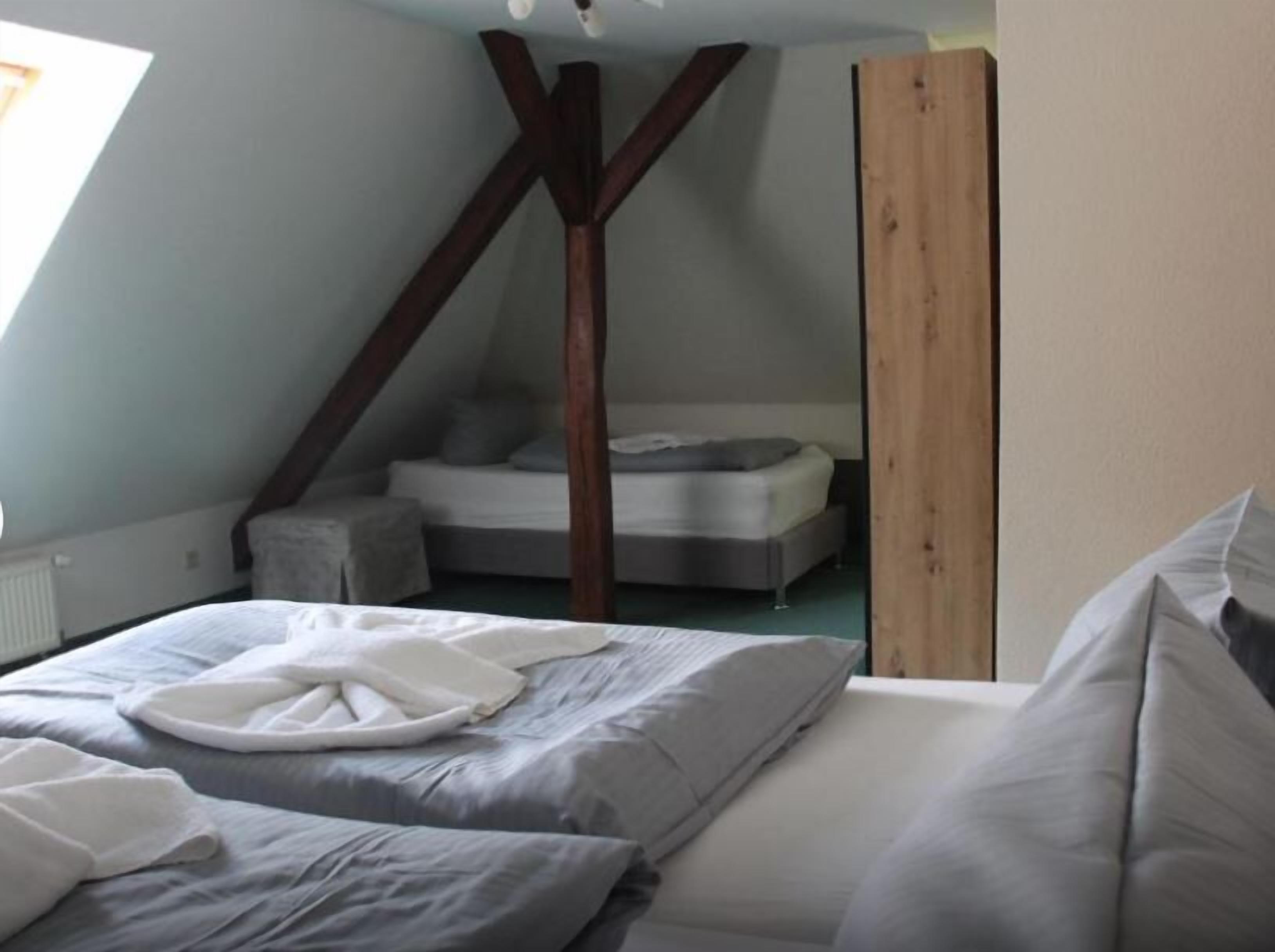 Premium bedding, pillowtop beds, desk, blackout drapes