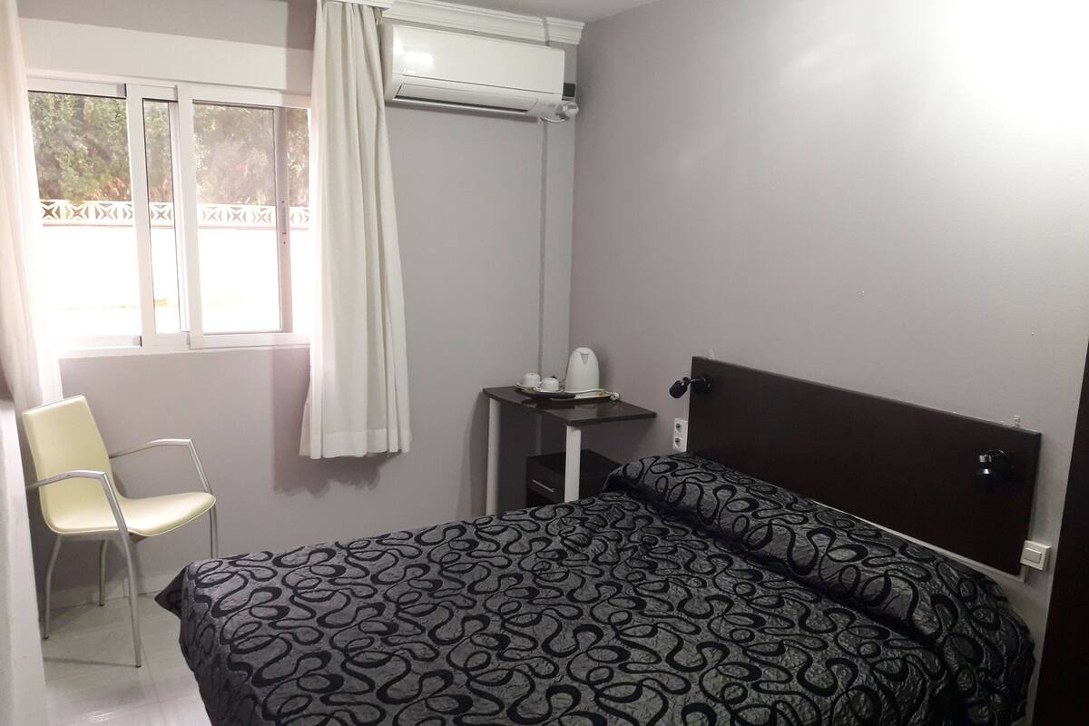 1 habitación y ropa de cama de alta calidad
