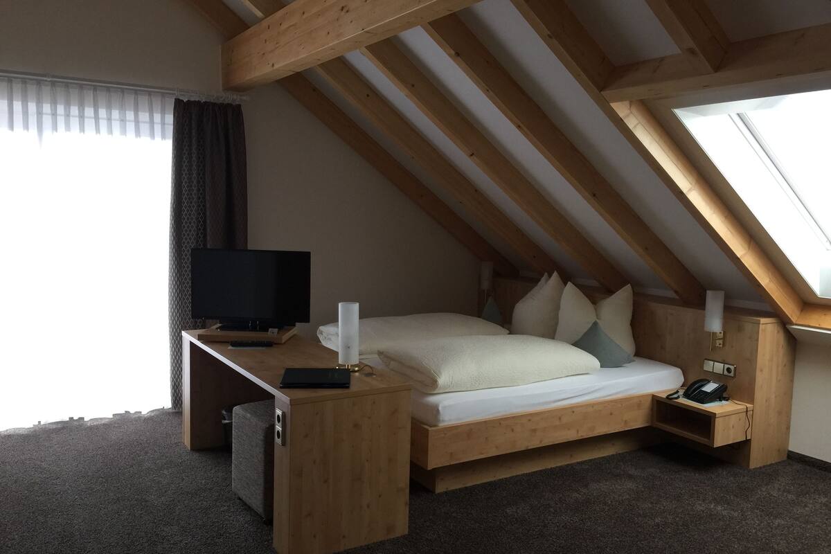 Comfort Double Room, 1 Bedroom | Living area | TV
