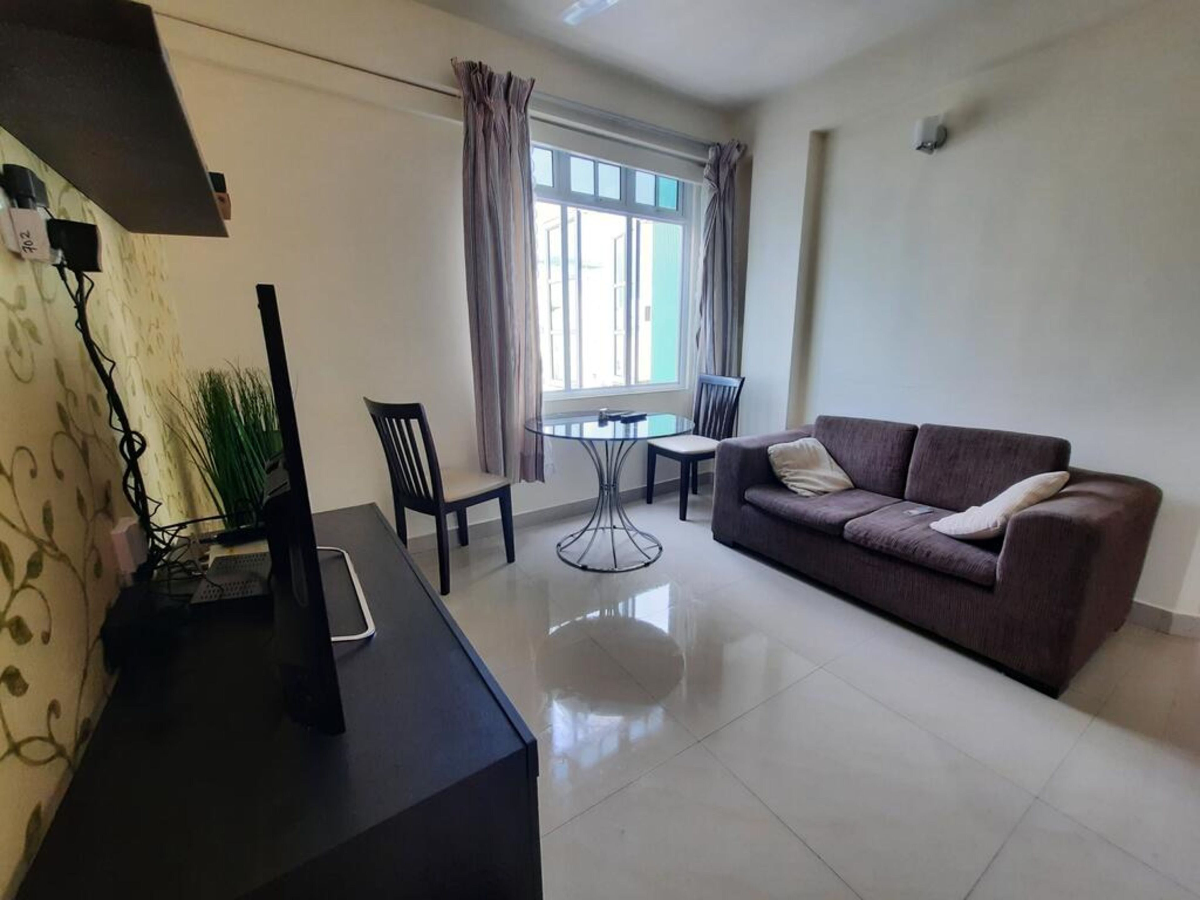 comfort suite | living room | 26-inch lcd tv with satellite channels, tv, streaming services