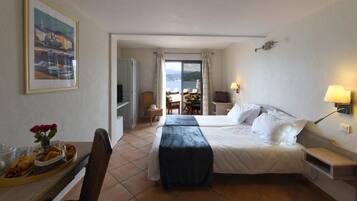 In-room safe, blackout curtains, iron/ironing board, cots/infant beds