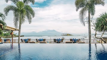 2 outdoor pools, pool umbrellas, pool loungers