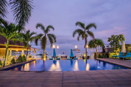 2 outdoor pools, pool umbrellas, sun loungers