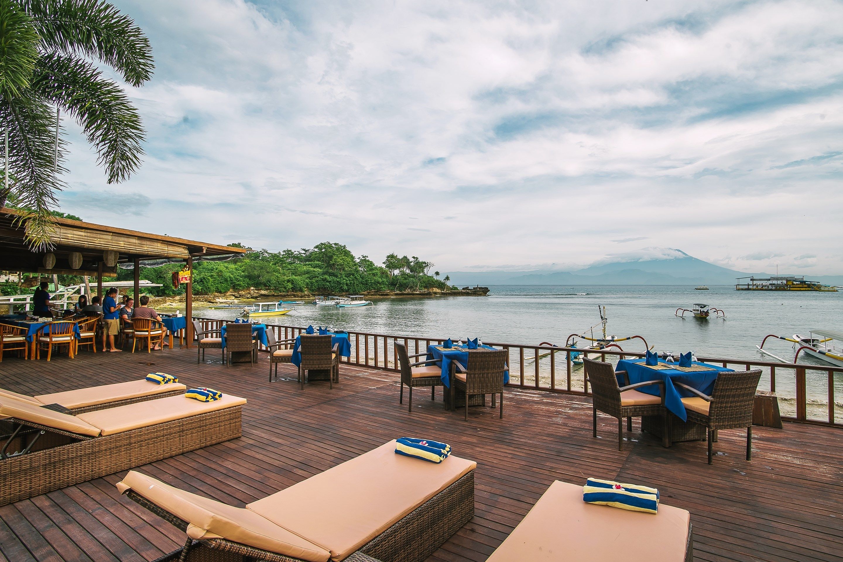 on the beach, sun-loungers, beach umbrellas, beach towels