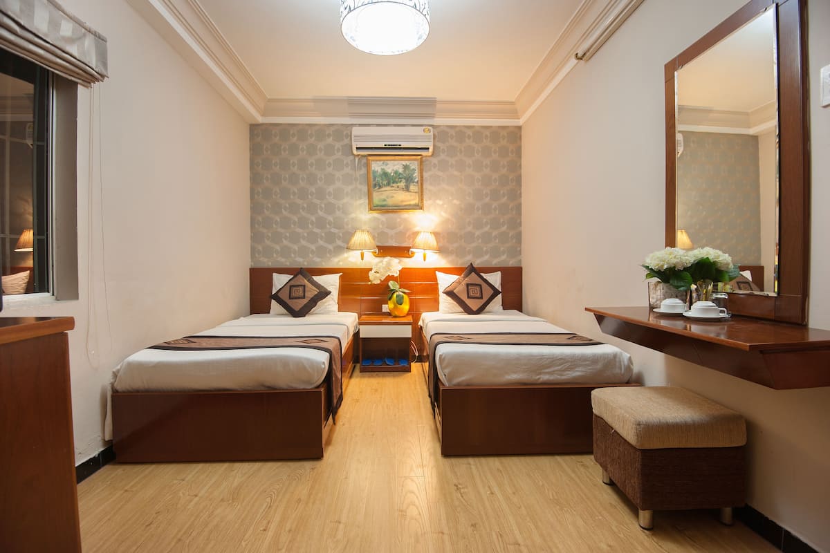 Chambre Standard avec lits jumeaux | Coffres-forts dans les chambres, bureau, lits pliants/supplémentaires