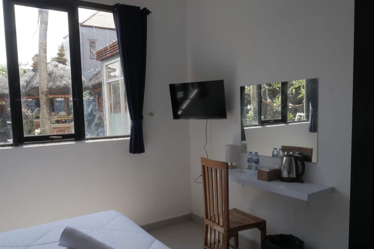 Cortinas blackout, wifi gratis y ropa de cama