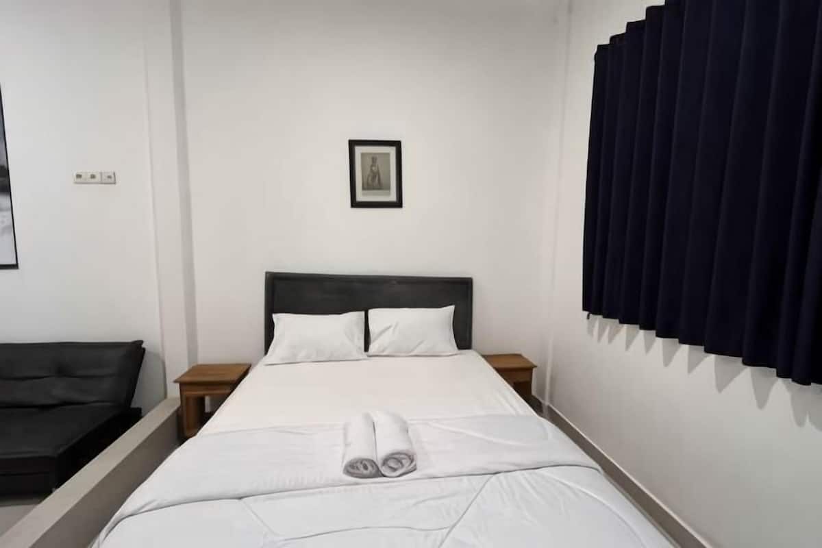 Blackout drapes, soundproofing, WiFi (free), bed sheets