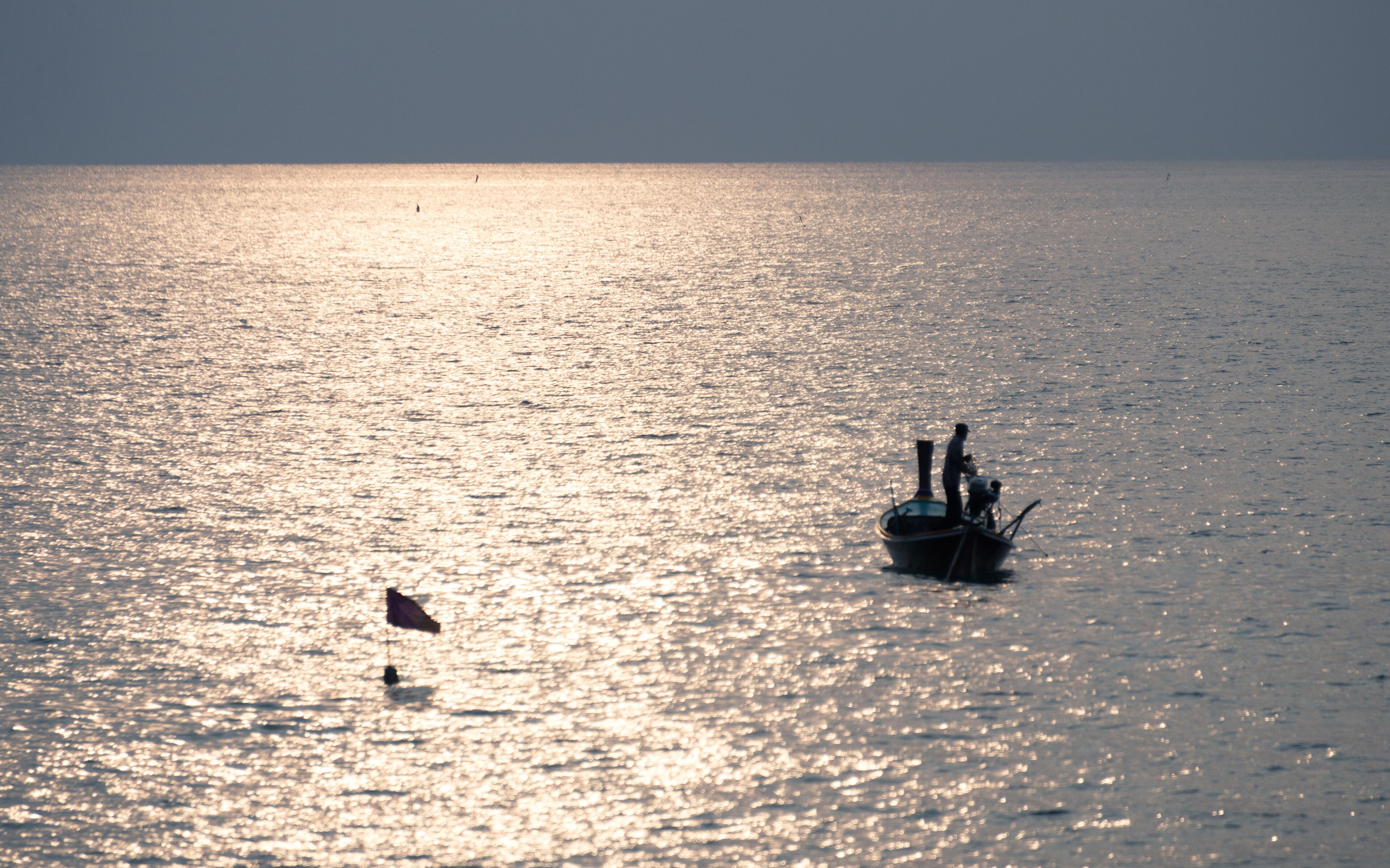 on the beach, sun-loungers, beach umbrellas, beach towels