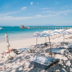 Private beach, white sand, beach umbrellas, beach towels