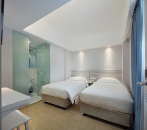 Habitación estándar con 2 camas individuales, 2 camas individuales | Escritorio, cortinas opacas, wifi gratis