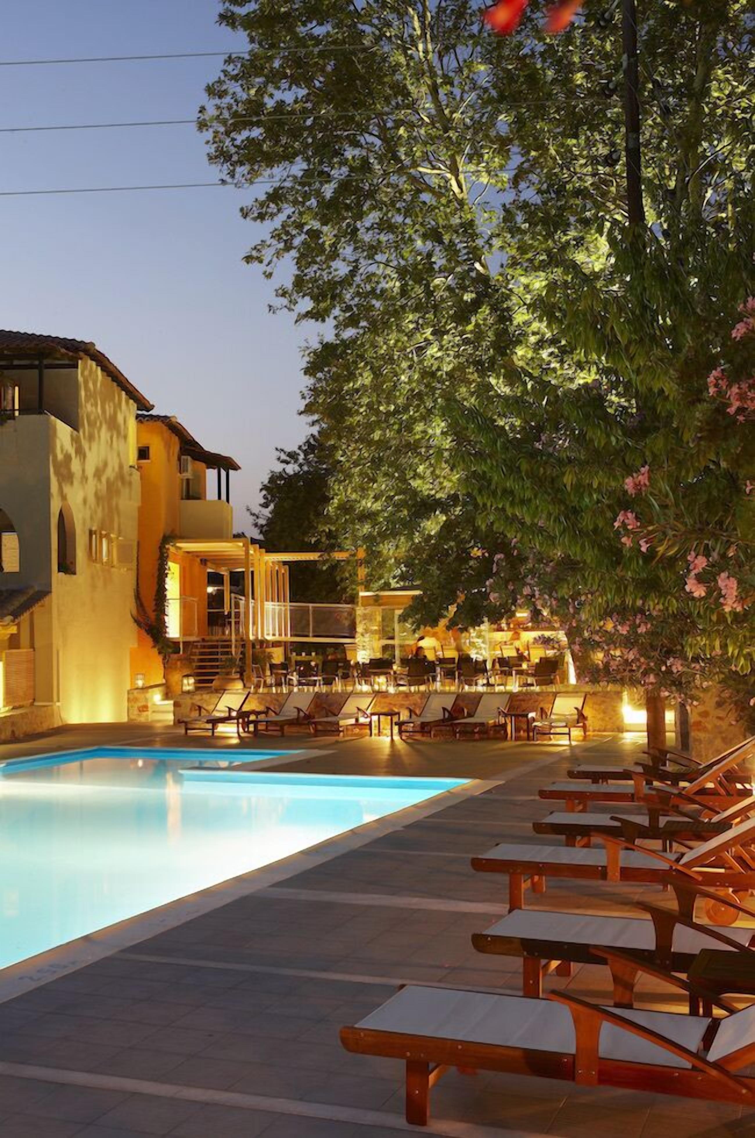 outdoor pool, pool umbrellas, pool loungers