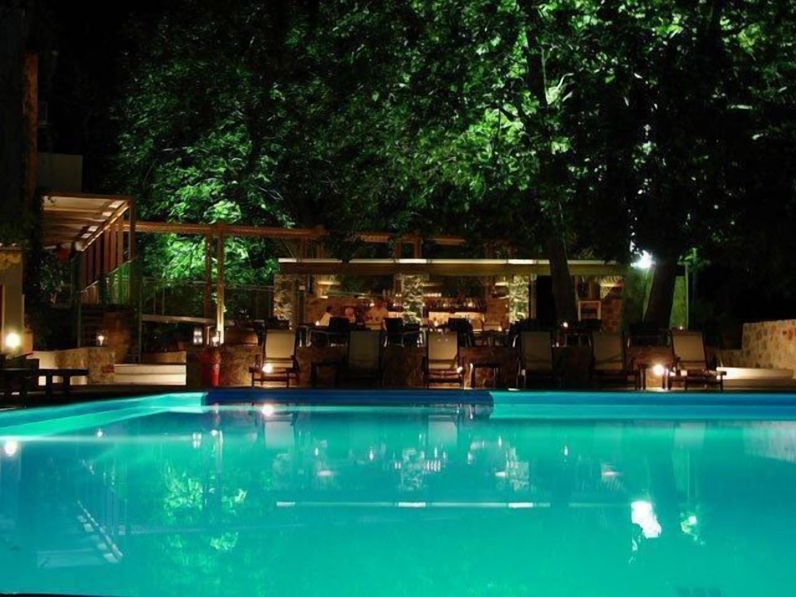 outdoor pool, pool umbrellas, pool loungers