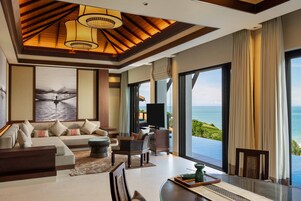 One Bedroom Seaview Hill Pool Villa | Living area | LCD TV, foosball, table tennis, toys