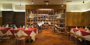 Breakfast, lunch, dinner served; local cuisine 