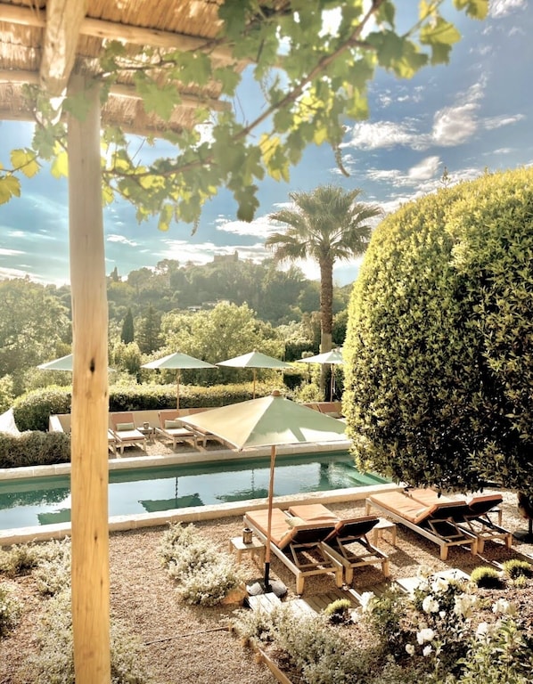 2 outdoor pools, pool umbrellas, sun loungers