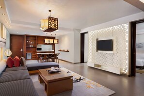 Courtyard One Bedroom Suite | Living area | 42-inch TV with cable channels, fireplace, toys - Angsana Lang Co (Hue City)