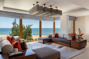 Skypool Seaview Two Bedroom Loft | Living room | 42-inch TV with cable channels, fireplace, toys - Angsana Lang Co (Hue City)