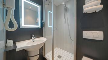 Shower, free toiletries, hair dryer, towels