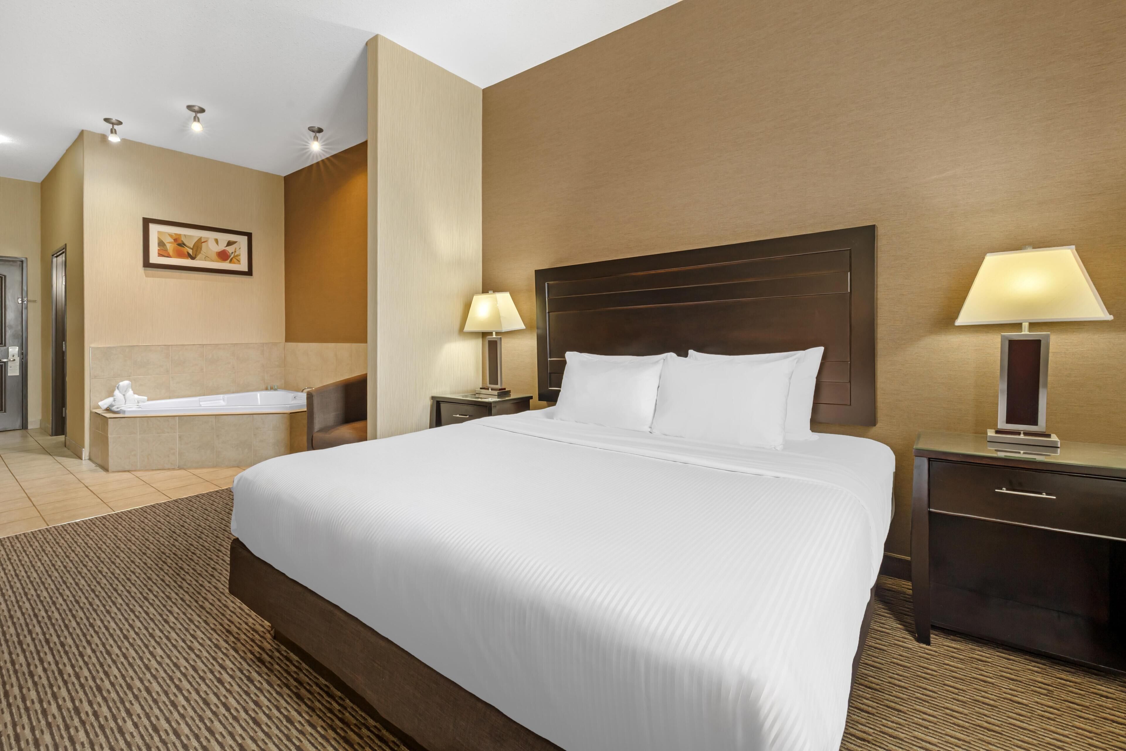 Suite, 1 King Bed, Non Smoking, Jetted Tub | Pillow-top beds, desk, laptop workspace, blackout curtains