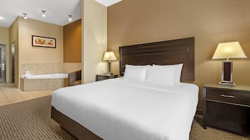 Suite, 1 King Bed, Non Smoking, Jetted Tub | Pillow-top beds, desk, laptop workspace, blackout curtains