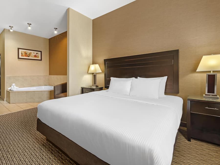 Suite, 1 King Bed, Non Smoking, Jetted Tub | Pillow-top beds, desk, laptop workspace, blackout curtains