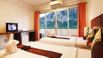 Habitación superior | Minibar, caja de seguridad en la habitación, escritorio y wifi gratis