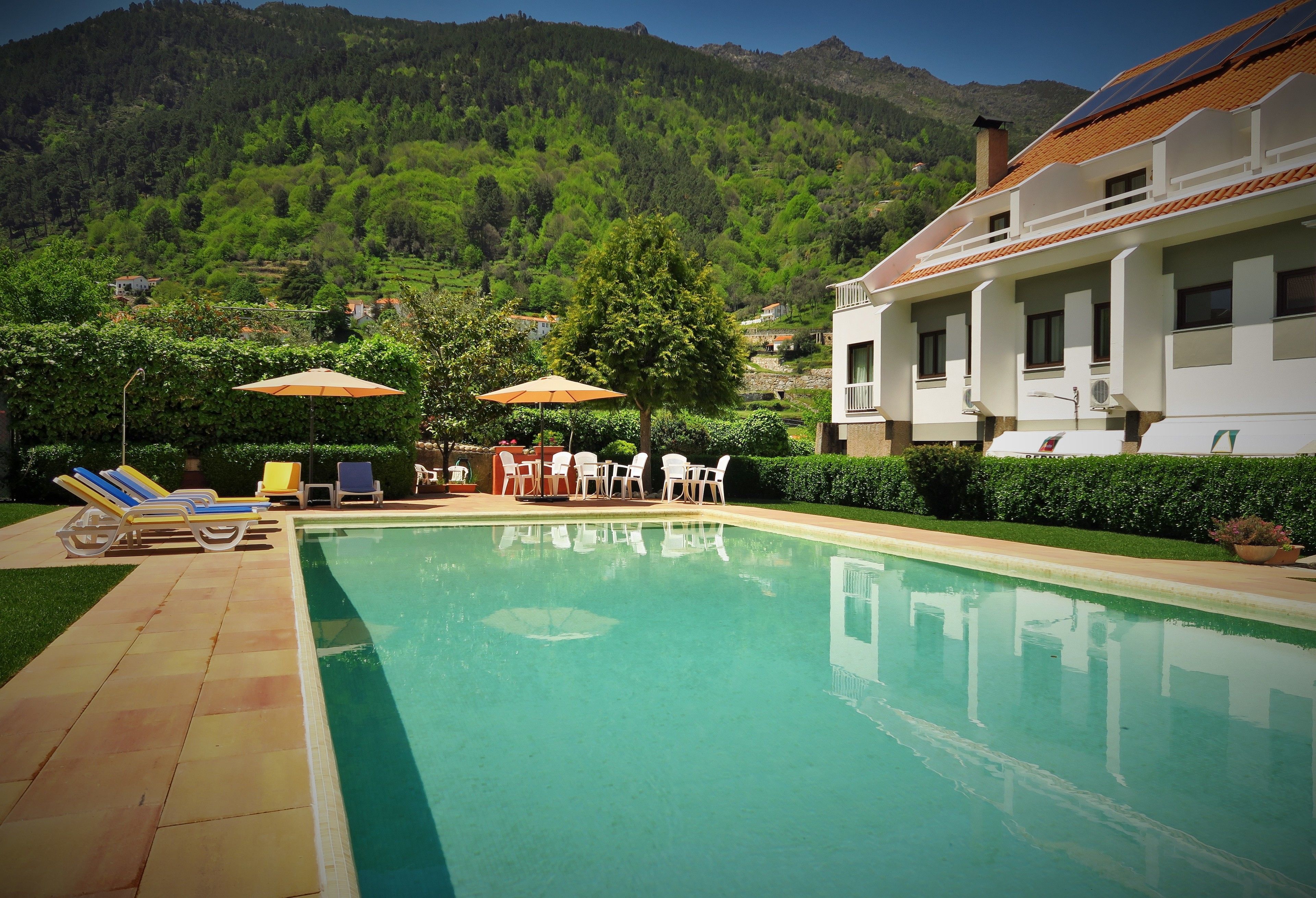 outdoor pool, pool loungers