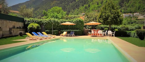 Outdoor pool, sun loungers