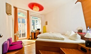 Tweepersoonskamer | Hypoallergeen beddengoed, een minibar, individueel gedecoreerd